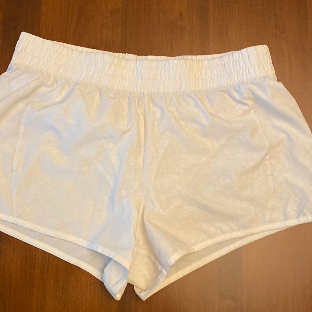 Marika white athletic shirts size large